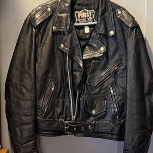 Vintage,  motorcycle jacket in black by “FIRST LEATHER” size  “medium”